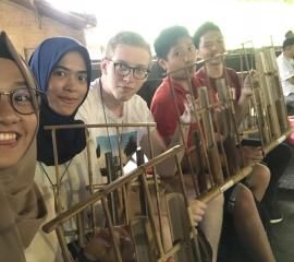 we played the traditional music instrument from Indonesia called Angklung at Saung Udjo, Bandung
