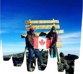 Our SEPer at the top of Mount Kilimanjaro ( 5895metres)